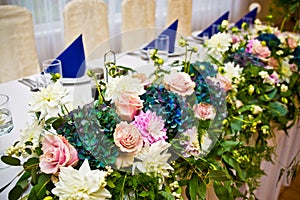 Wedding hall table flowers decoration detail