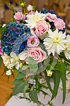 Wedding hall table flowers decoration detail