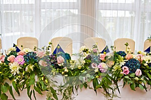 Wedding hall table flowers decoration detail