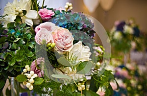 Wedding hall table flowers decoration detail