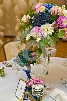 Wedding hall table flowers decoration detail