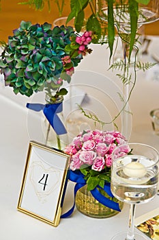 Wedding hall table flowers decoration detail