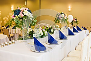 Wedding hall table flowers decoration detail