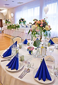 Wedding hall table flowers decoration detail