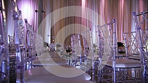 Wedding hall wedding decoration. Chairs are prepared for the ceremony