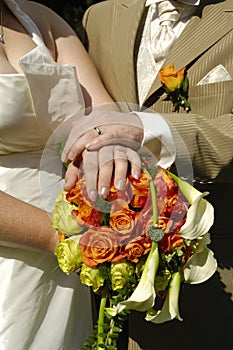 Wedding hands and flowers