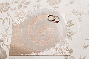 Wedding invitation card with rings, empty with space to fill with text