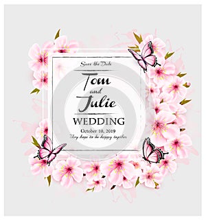 Wedding invitation desing with pink flowers and butterflies photo