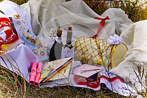 Wedding items, composition of festive paraphernalia for the wedding. Colorful scenery in nature, photo for memory.