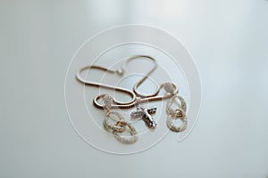 Wedding jewelry, white earrings and bracelet bride, wedding ceremony, the bride`s morning, preparing for the wedding