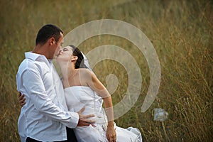 Wedding kiss (bride and groom love)