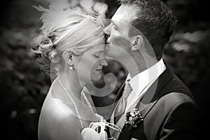 Wedding kiss on forehead