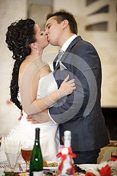 Wedding kiss happy groom and bride
