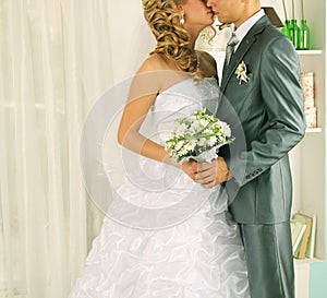 Wedding kiss just married couple