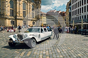 Wedding and long white limousine
