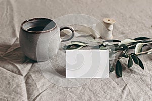 Wedding moody still life, table composition. Closeup of place, business card mockup scene with cup of coffe, blurred