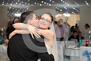 Wedding party kiss