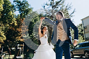 Wedding party outdoor. Open air firs wedding dance happy bride and groom