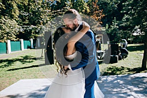 Wedding party outdoor. Open air firs wedding dance happy bride and groom