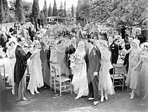 Wedding party toasting to the bride and groom