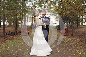 Wedding photo in autumn park