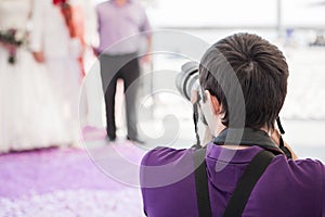 Wedding photographer in action