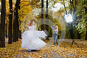 Wedding photographer is taking pictures the bride