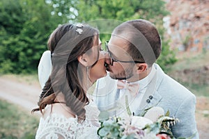 Wedding photography kiss bride and groom in different locations