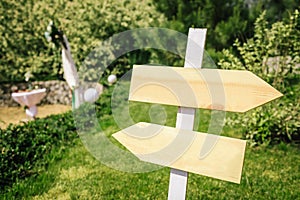 Wedding pointer in rustic style for a ceremony in garden photo