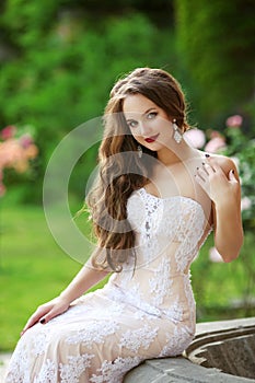 Wedding Portrait Of Beautiful smiling Bride with long wavy hair
