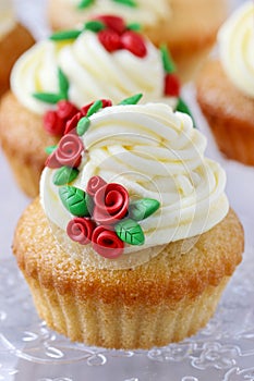 Wedding reception cupcakes decorated with sugarcraft red roses photo