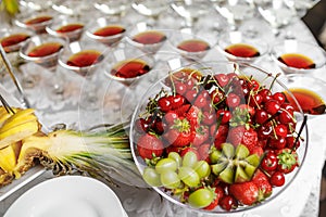 Wedding reception, decor table of fruits and caces