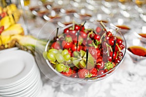 Wedding reception, decor table of fruits and caces