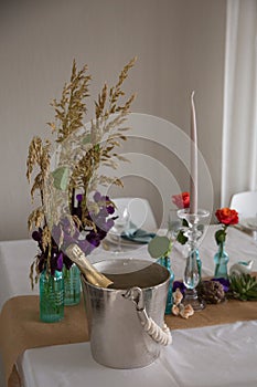 wedding reception table with champagne cooler