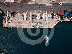 Wedding Reception Table Setting, dinner by the sea aerial top view. Guests at the wedding banquet sit at the table, the