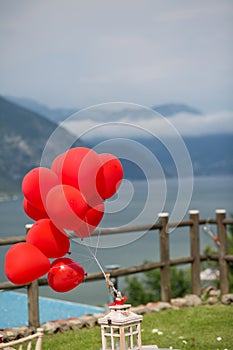 Wedding with red balloons of outside marriage