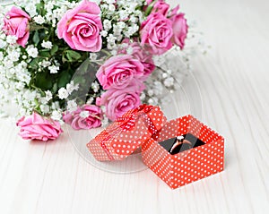 Wedding ring with a bouquet of roses.