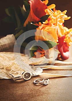 Wedding ring with bouquet on velvet