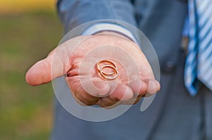 Wedding ring in hand