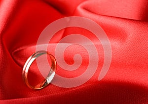 Wedding Ring Over Red Background
