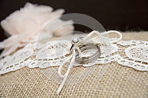 Wedding ring on pillow