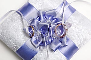 Wedding ring pillow with bow.