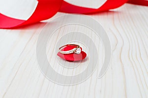 Wedding ring on the red heart
