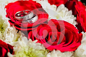 wedding ring, red and white roses