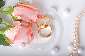Wedding ring & rose photo