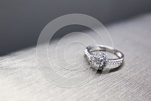 Wedding ring on silver ground