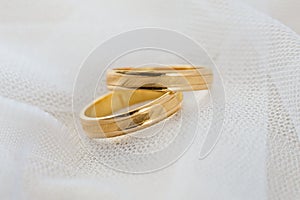 Wedding ring on white veil