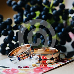 Wedding rings arranged on the invitation card.