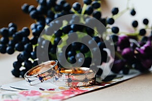 Wedding rings arranged on the invitation card.