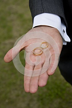 Wedding Rings in the best mans hand.